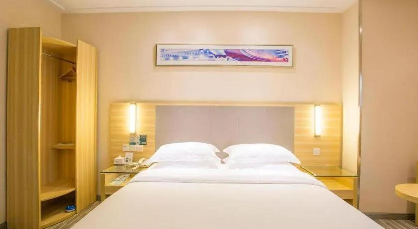Bed in City Comfort Inn Fangcheng Qunxing Avenue