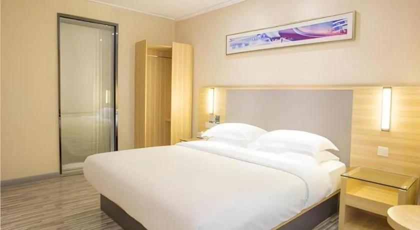 Bed in City Comfort Inn Fangcheng Qunxing Avenue