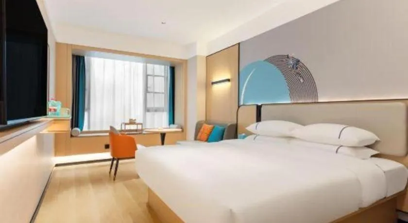 Bed in City Comfort Inn Huanggang Tuanfeng Passenger