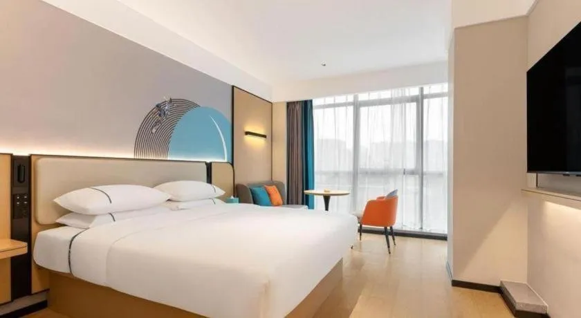 Bed in City Comfort Inn Huanggang Tuanfeng Passenger