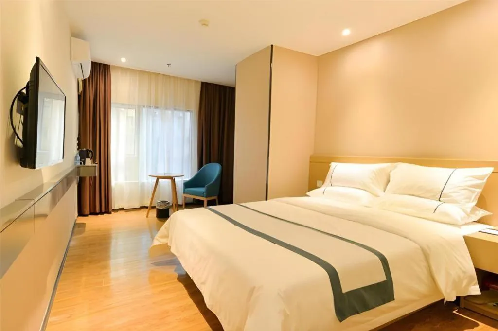 Bed in City Comfort Inn Zhuhai Qinglv Middle Road Riyuebei Grand Theater