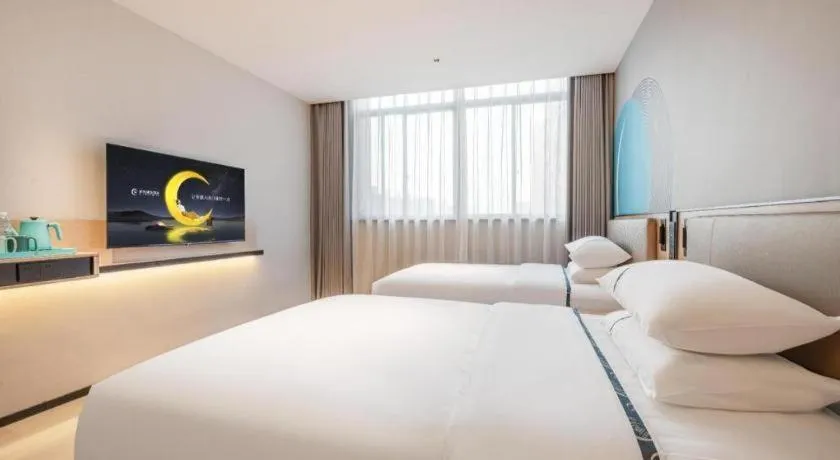 Bed in City Comfort Inn Nanchang Gaoxin Avenue Metro Station Aixi Lake