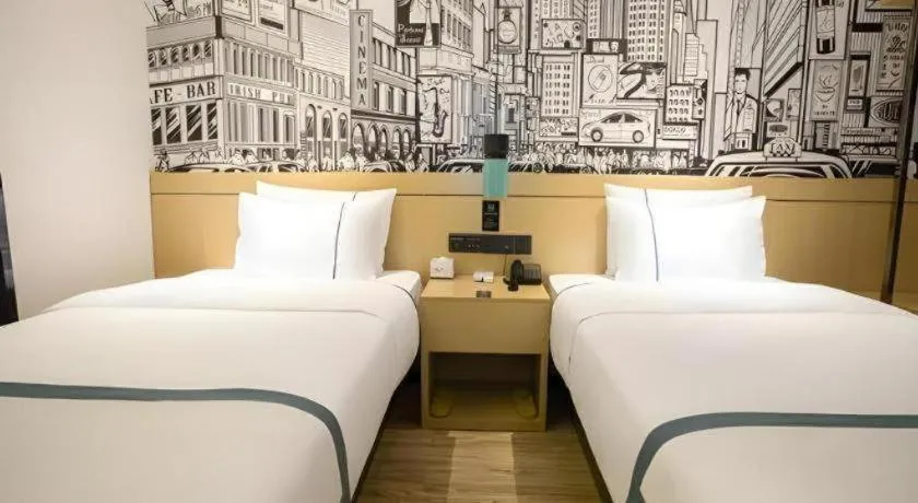 Bed in City Comfort Inn Beiliu Yongfeng Plaza Chengnan Bus Station