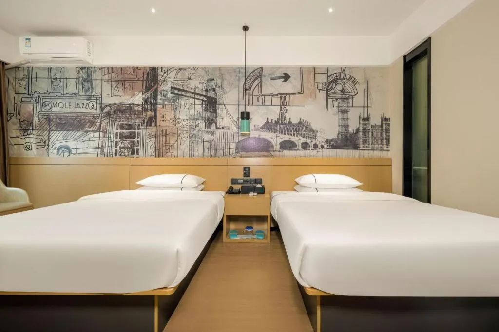 Bed in City Comfort Inn Beiliu Yongfeng Plaza Chengnan Bus Station