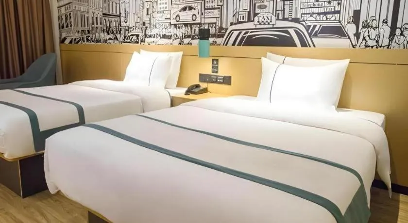 Bed in City Comfort Inn Beiliu Yongfeng Plaza Chengnan Bus Station