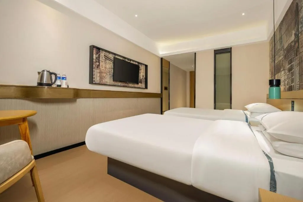 Bed in City Comfort Inn Beiliu Yongfeng Plaza Chengnan Bus Station