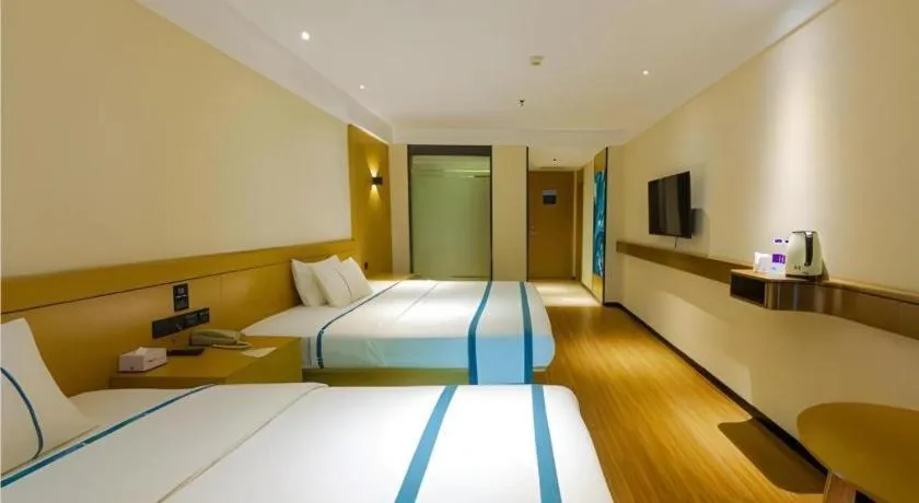 Bed in City Comfort Inn Zhanjiang Xuwen Port Wharf Passenger Station