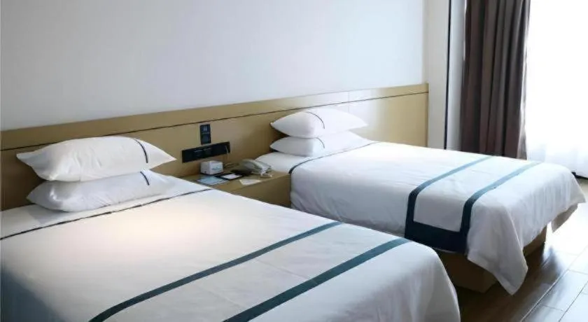 Bed in City Comfort Inn Zhanjiang Xuwen Port Wharf Passenger Station