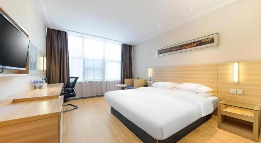 Bed in City Comfort Inn Jingmen Zhongjian Jinxiang Square