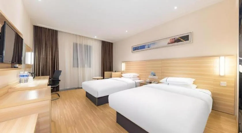 Bed in City Comfort Inn Jingmen Zhongjian Jinxiang Square