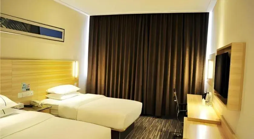 Bed in City Comfort Inn Jingmen Zhongjian Jinxiang Square Bed in City Comfort Inn Jingmen Zhongjian Jinxiang Square