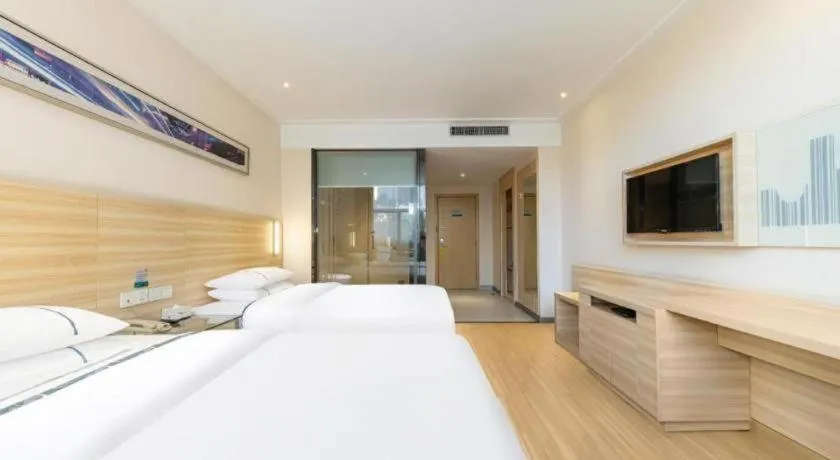 Bed in City Comfort Inn Jingmen Zhongjian Jinxiang Square