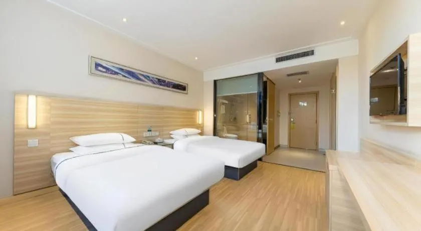 Bed in City Comfort Inn Jingmen Zhongjian Jinxiang Square