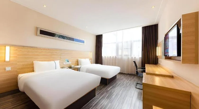 Bed in City Comfort Inn Jingmen Zhongjian Jinxiang Square