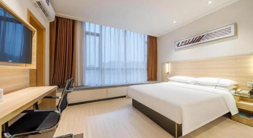 Bed in City Comfort Inn Maoming Xinyi Yudu Park