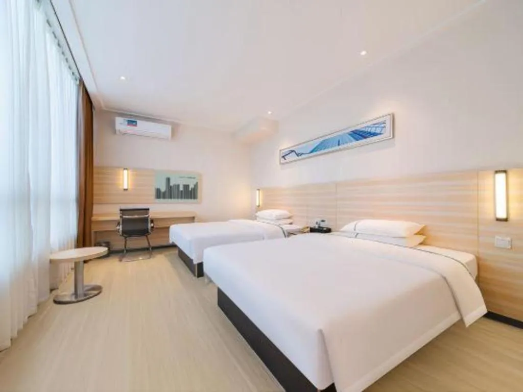 Bed in City Comfort Inn Maoming Xinyi Yudu Park