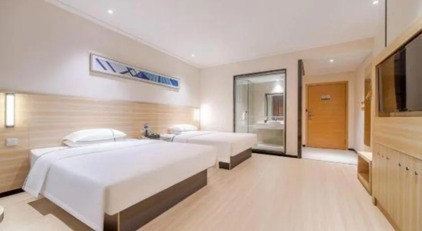 Bed in City Comfort Inn Maoming Xinyi Yudu Park