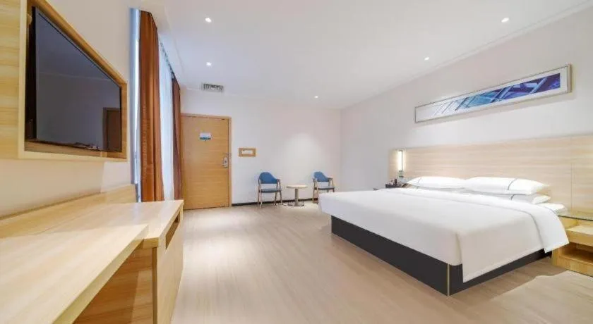 Bed in City Comfort Inn Maoming Xinyi Yudu Park