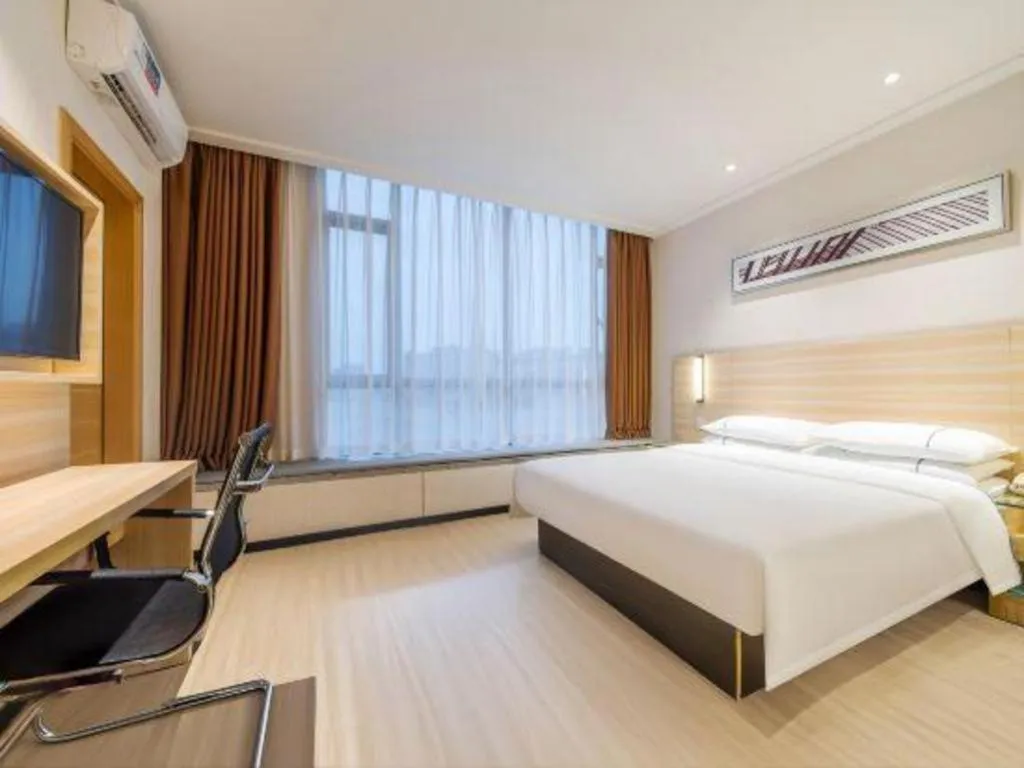Bed in City Comfort Inn Maoming Xinyi Yudu Park