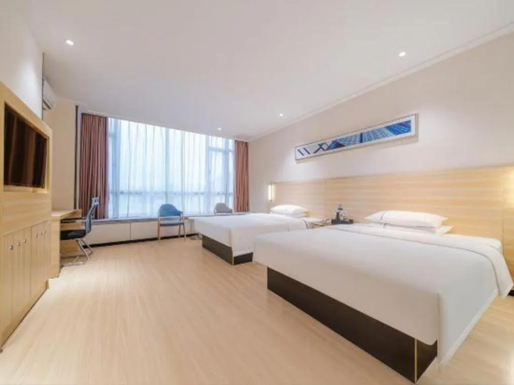 Bed in City Comfort Inn Maoming Xinyi Yudu Park