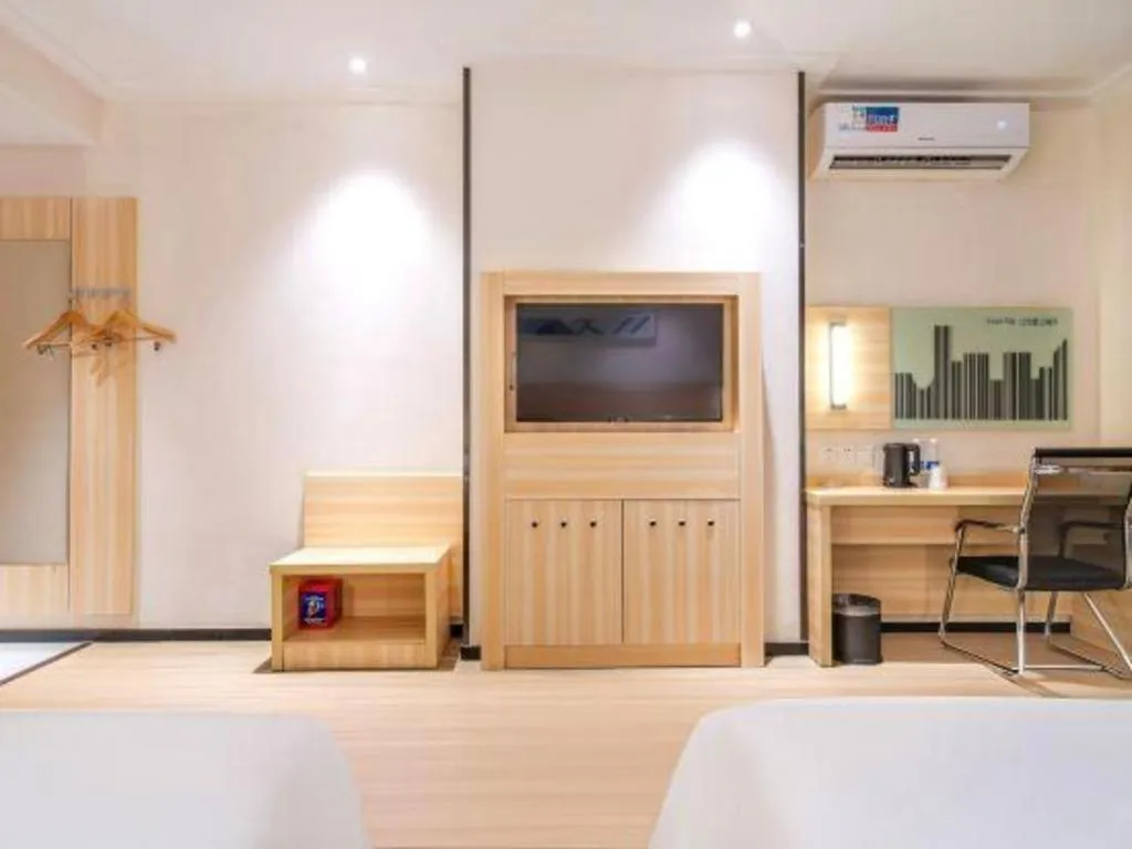 Bed in City Comfort Inn Maoming Xinyi Yudu Park
