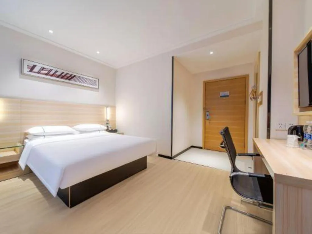 Bed in City Comfort Inn Maoming Xinyi Yudu Park