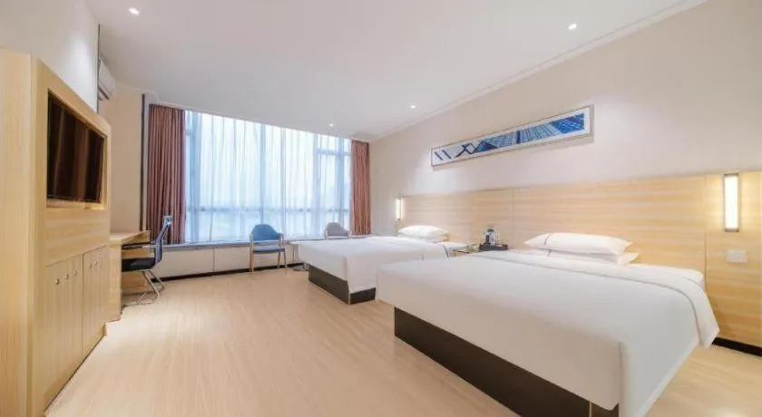 Bed in City Comfort Inn Maoming Xinyi Yudu Park