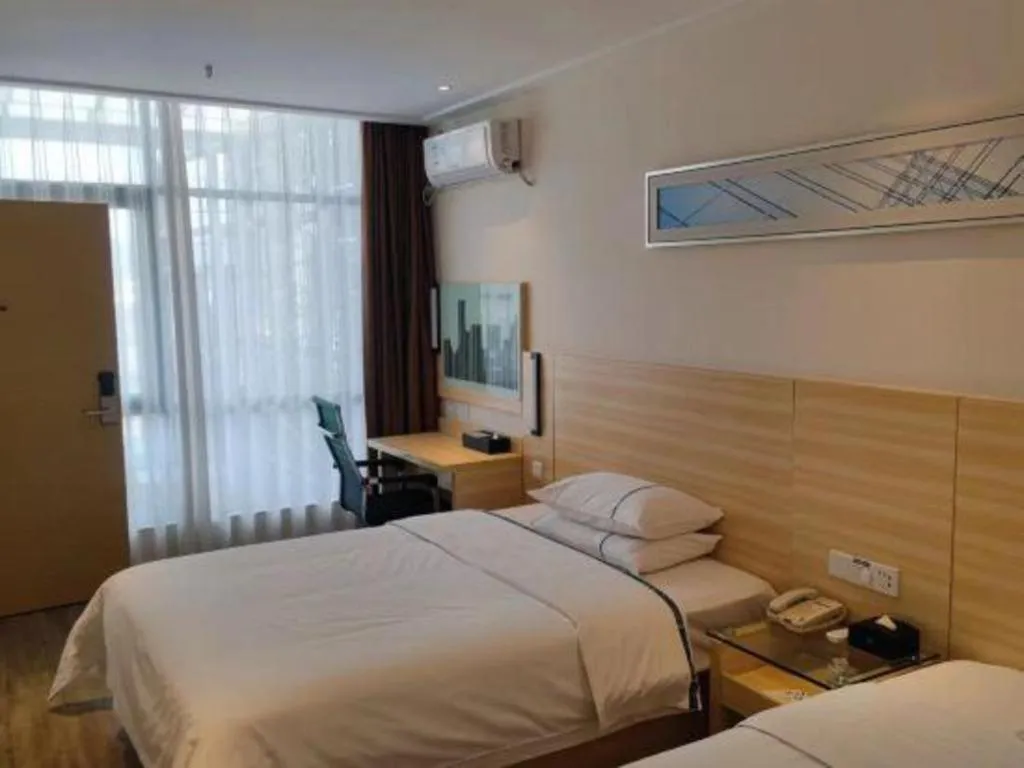 Bed in City Comfort Inn Maoming Xinyi Yudu Park