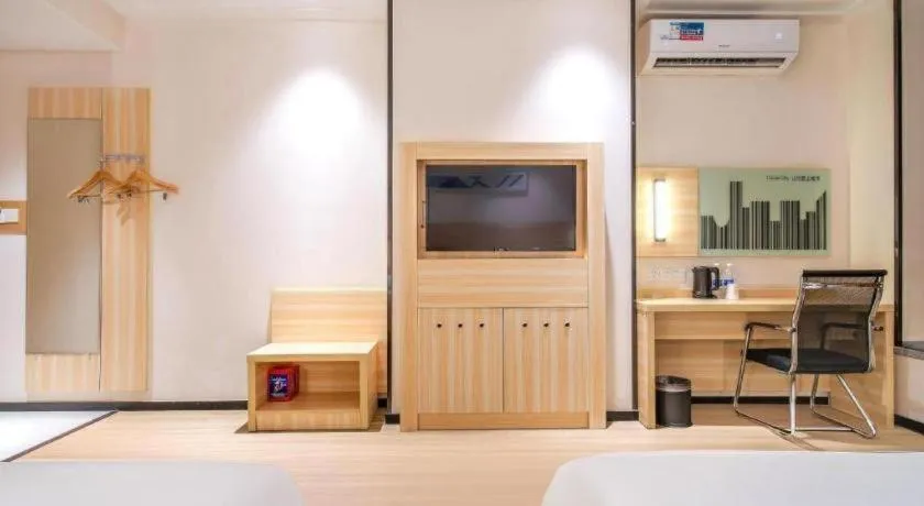 Bed in City Comfort Inn Maoming Xinyi Yudu Park