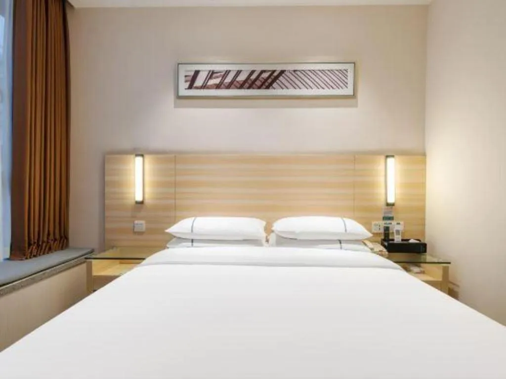 Bed in City Comfort Inn Maoming Xinyi Yudu Park