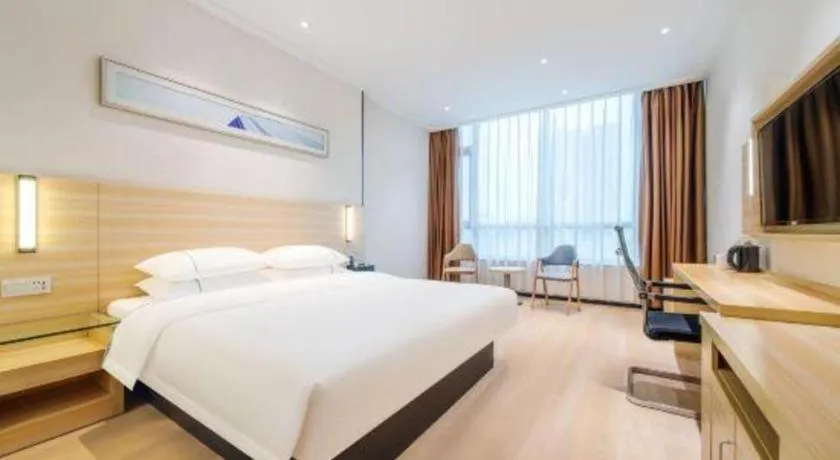 Bed in City Comfort Inn Maoming Xinyi Yudu Park
