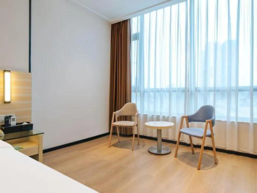 Bed in City Comfort Inn Maoming Xinyi Yudu Park