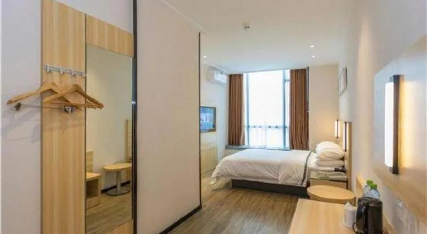 Bed in City Comfort Inn Maoming Xinyi Yudu Park