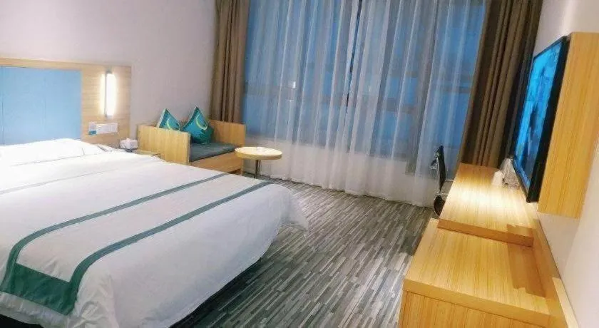 Bed in City Comfort Inn Deyang Shifang Yonghu Park
