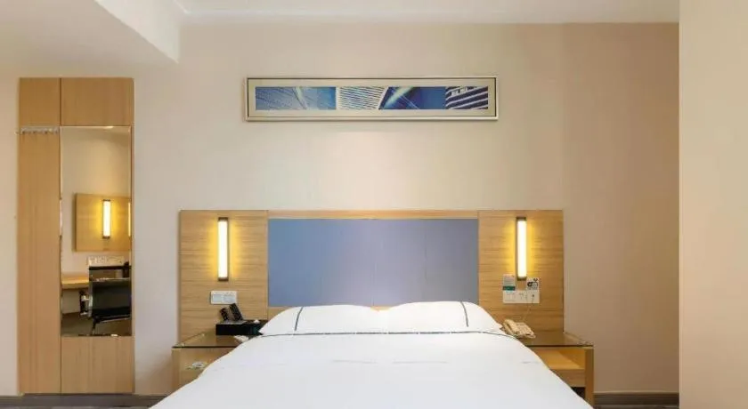 Bed in City Comfort Inn Deyang Shifang Yonghu Park