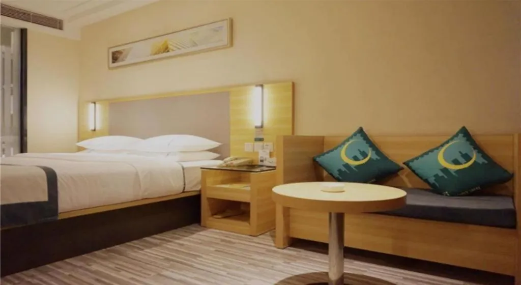 Bed in City Comfort Inn Deyang Shifang Yonghu Park