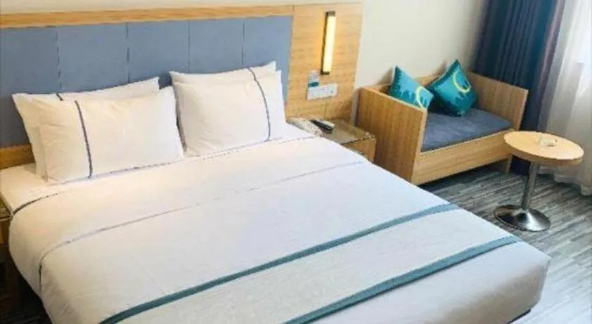 Bed in City Comfort Inn Deyang Shifang Yonghu Park