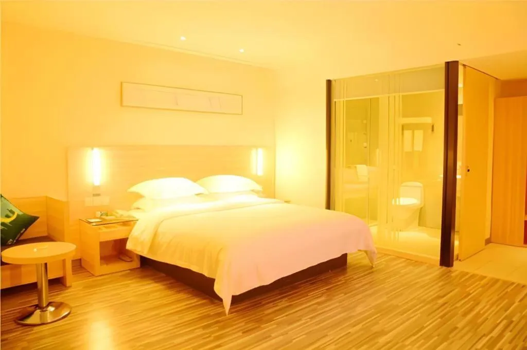 Bed in City Comfort Inn Deyang Shifang Yonghu Park