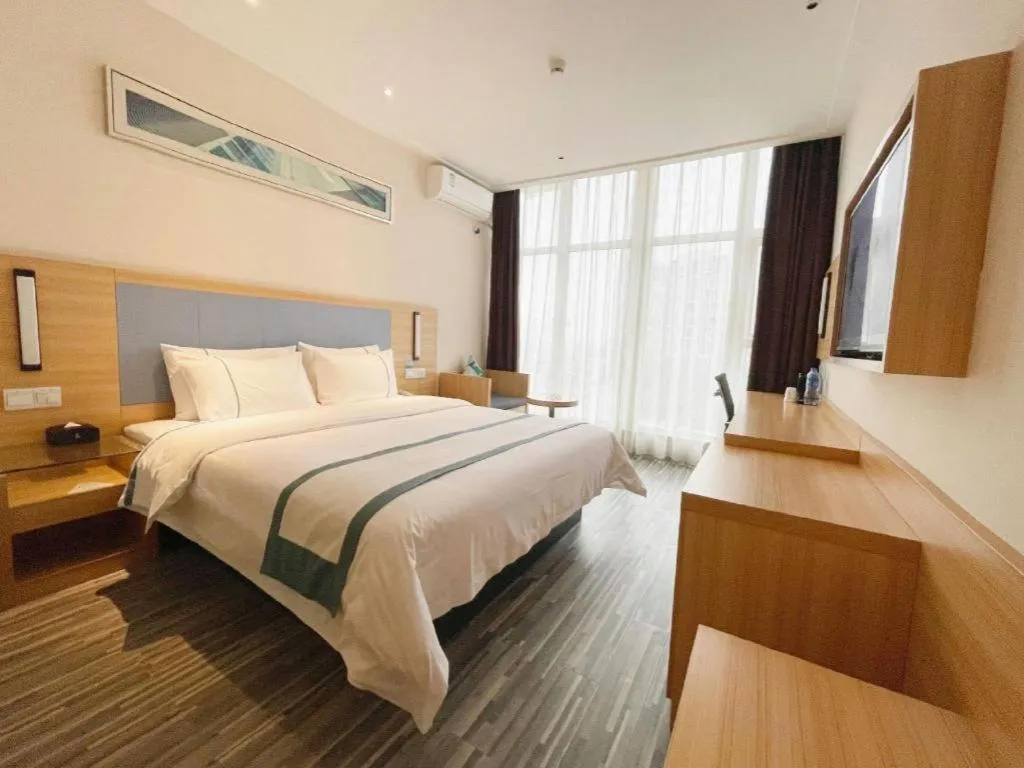 Bed in City Comfort Inn Deyang Shifang Yonghu Park