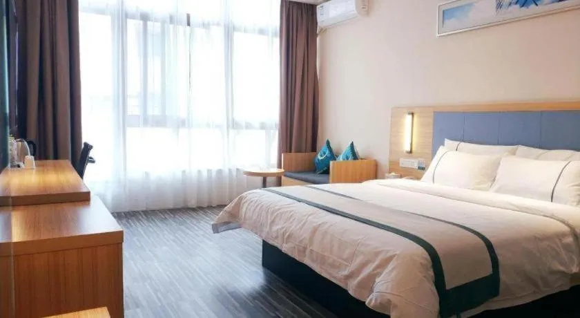 Bed in City Comfort Inn Deyang Shifang Yonghu Park