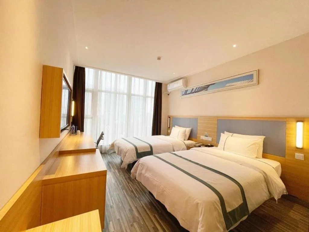 Bed in City Comfort Inn Deyang Shifang Yonghu Park