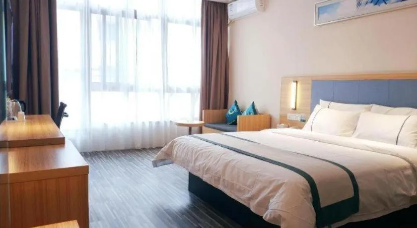 Bed in City Comfort Inn Deyang Shifang Yonghu Park