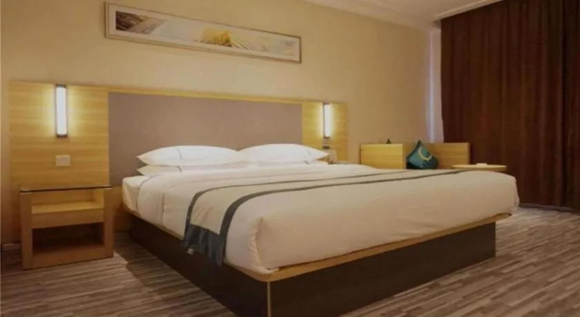 Bed in City Comfort Inn Deyang Shifang Yonghu Park