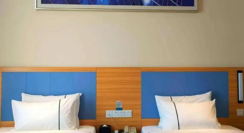 Bed in City Comfort Inn Deyang Shifang Yonghu Park