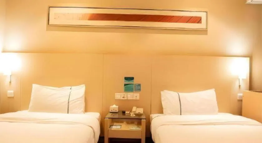 Bed in City Comfort Inn Xiantao Avenue Wangzhou Bridge Wushang