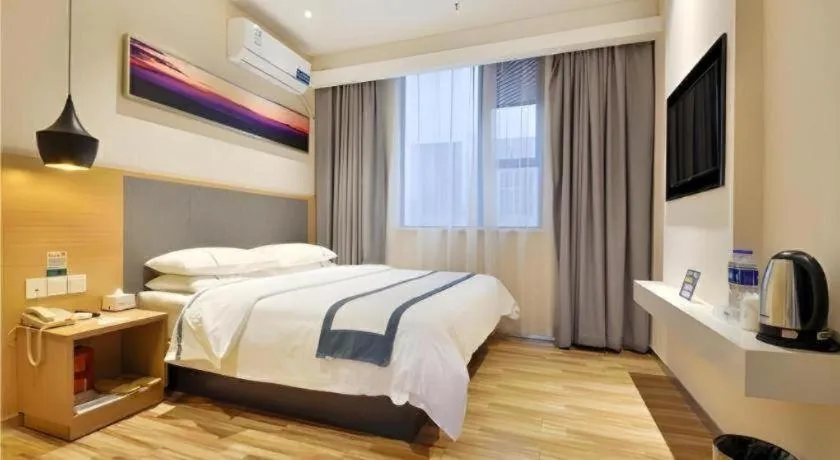 Bed in City Comfort Inn Wuhan Xinzhou Mo'er Cheng