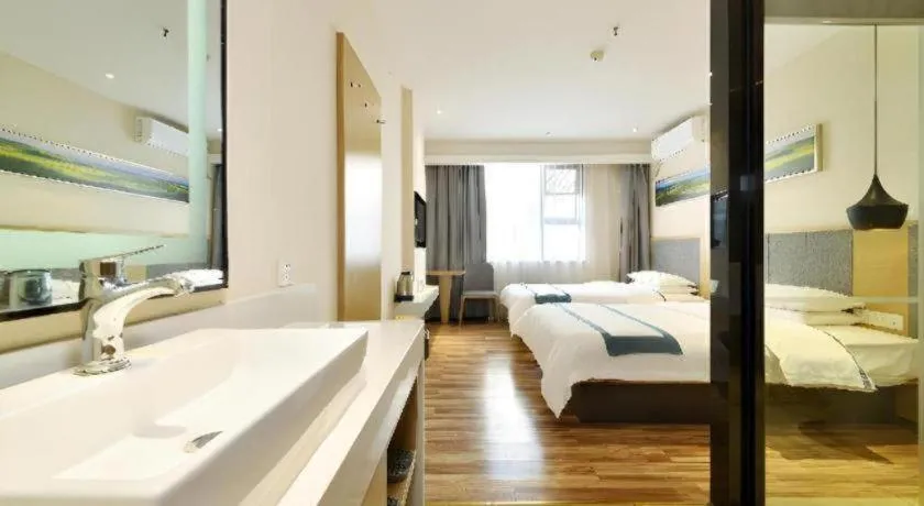 Bed in City Comfort Inn Wuhan Xinzhou Mo'er Cheng