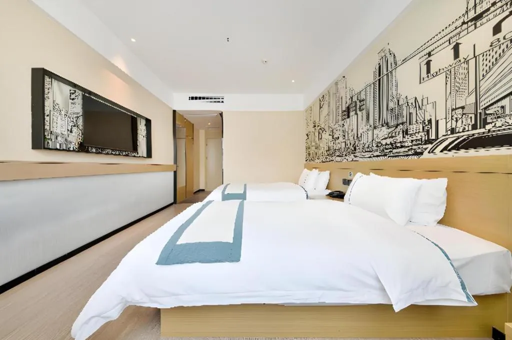 Bed in City Comfort Inn Wuhan Xinzhou Mo'er Cheng