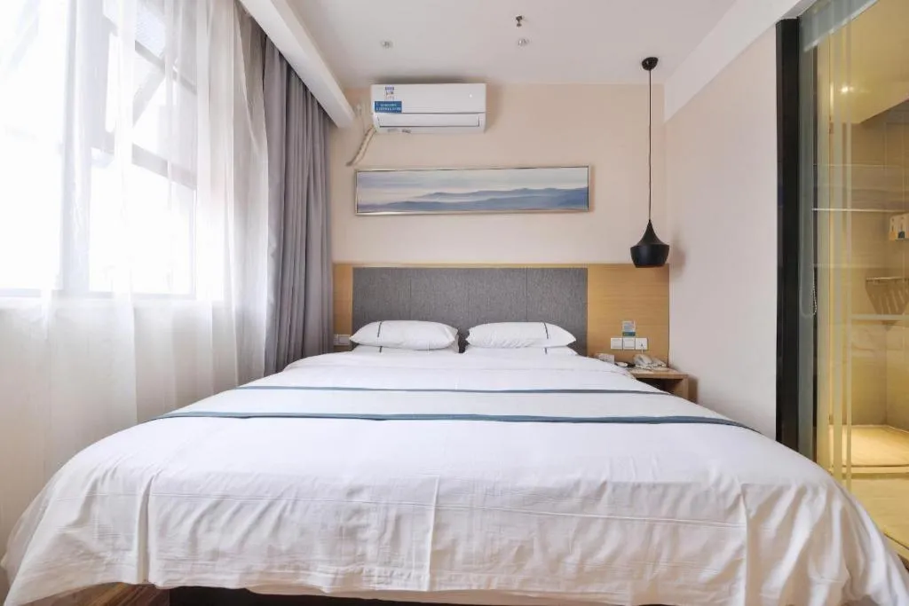 Bed in City Comfort Inn Wuhan Xinzhou Mo'er Cheng