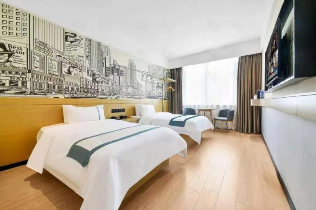 Bed in City Comfort Inn Wuhan Xinzhou Mo'er Cheng